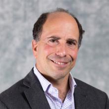 Headshot of Marc Rigas.